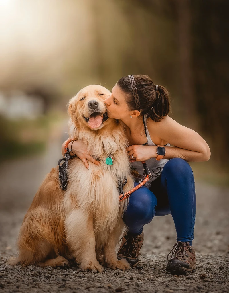 Dog owner with healthy dog using NativeGut digestive support supplement for gut health and wellness